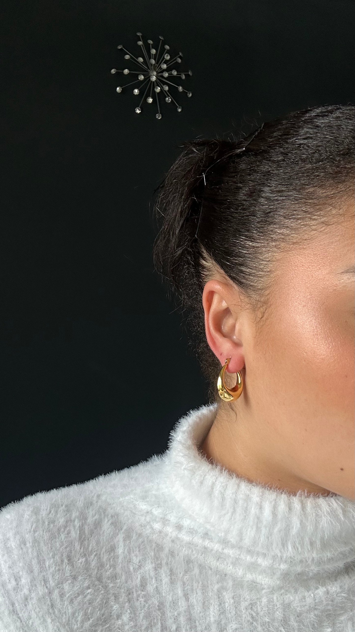 Boucles d'oreilles dotées d'une forme arrondie dorée, faites en acier inoxydable