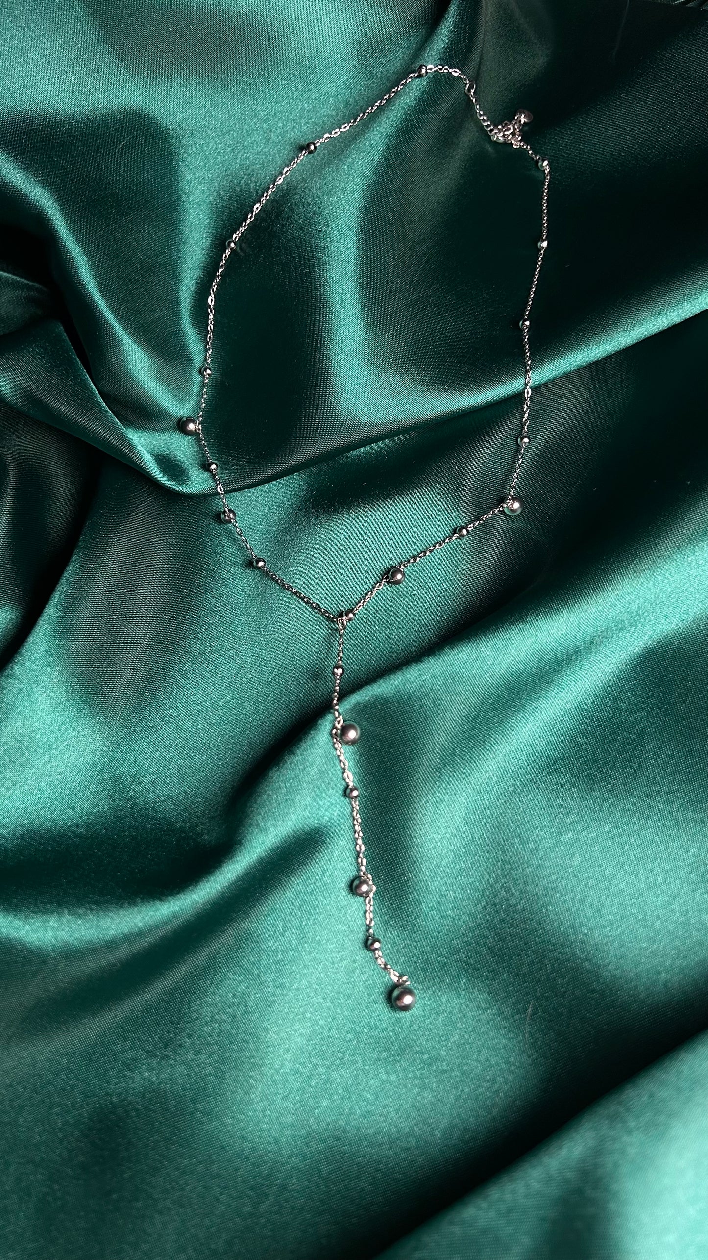 Collier long à pampilles avec perles rondes