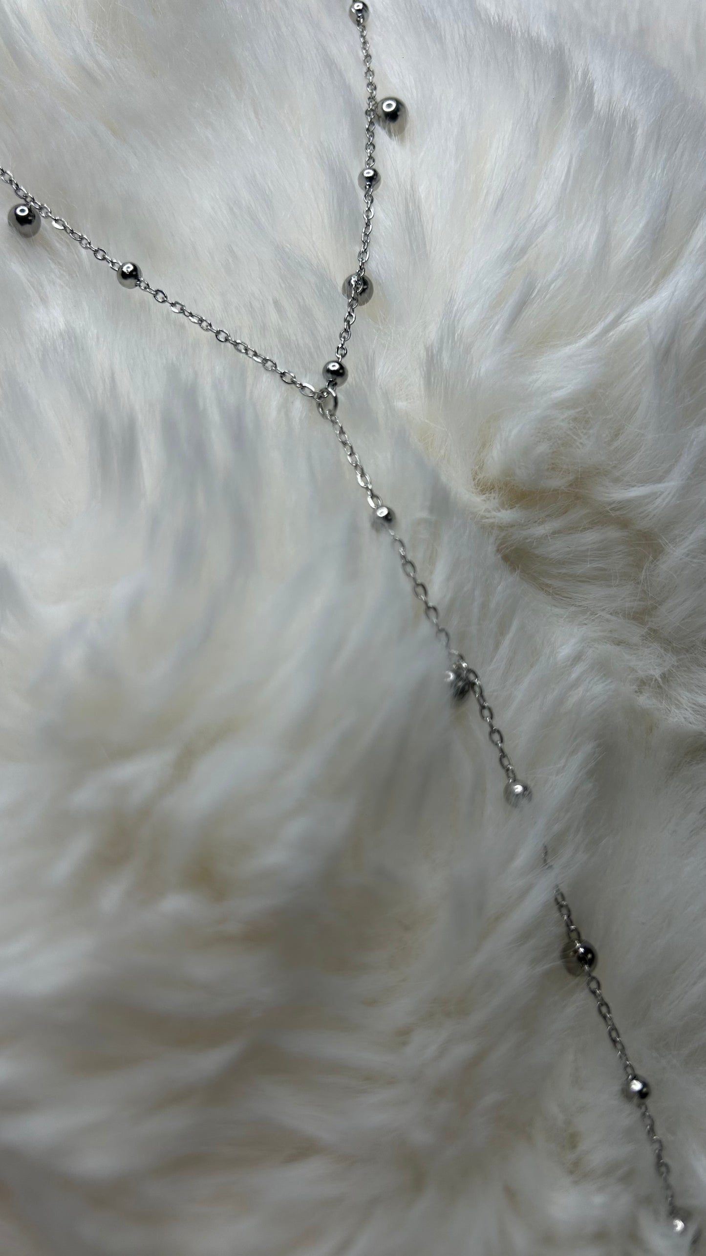 Collier long à pampilles avec perles rondes