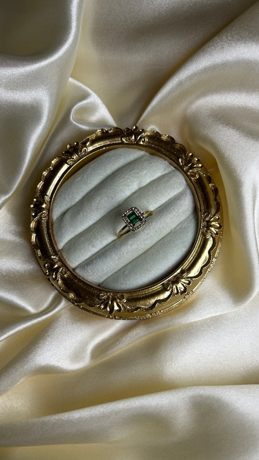 Bague ornée d'un diamant vert en acier inoxydable